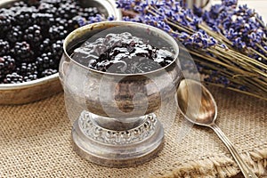 Silver vintage goblet of blackberry jam