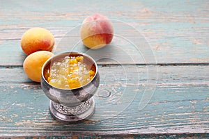 Silver vintage goblet of peach jam