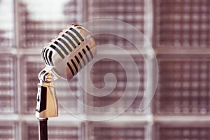 Silver vintage microphone in the studio on outdoor background