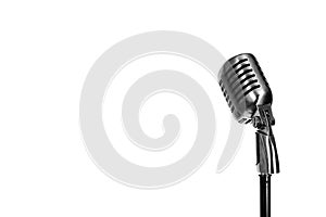 Silver vintage microphone in the studio on white background