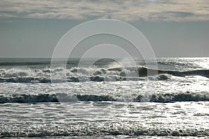 Silver Waves Breaking on the Shore