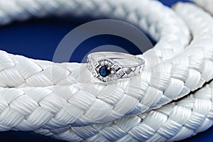 Silver wedding ring with sapphire and diamonds