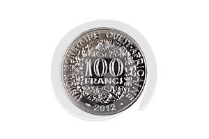 Silver 100 West African Franc coin on a white background