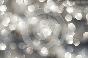 Silver and white bokeh lights defocused