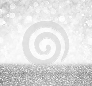 Silver and white bokeh lights defocused. abstract background