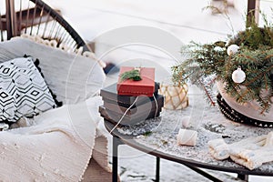 Silver and white christmas ornaments, xmas tree on rustic wood background with sparkle bokeh lights. Merry christmas card. Winter