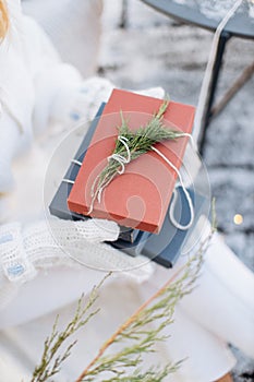 Silver and white christmas ornaments, xmas tree on rustic wood background with sparkle bokeh lights. Merry christmas card. Winter