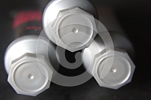 Silver white hexagonal shaped lids on  tubes