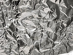 Silver wrinkled foil texture for background