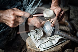At silversmith`s workshop with traditional tools photo