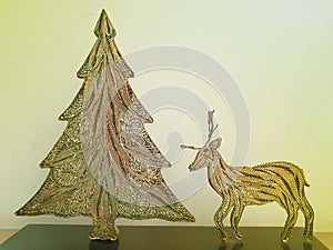 silversmith work of christmas tree and reindeer