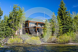 Silverthorne, Colorado Town Hall on a Sunny Day with the Blue River