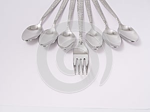 Silverware forks spoons knives cutlery on a white background