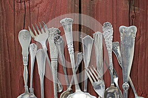 Silverware on red wooden table-horizontal