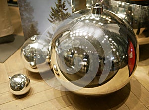 Silvery colored Christmas decorations - big balls of different size