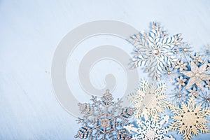 Silvery snowflakes on a blue background