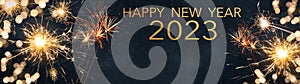 Silvester 2023 Happy New Year, New Year`s Eve Party background banner panorama long greeting card - Golden firework fireworks and