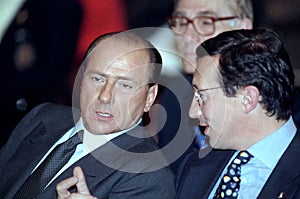 Silvio Berlusconi and Gianfranco Fini during a political conference