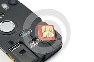 SIM card close-up next to the connector in the smartphone