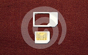 SIM card micro on brown