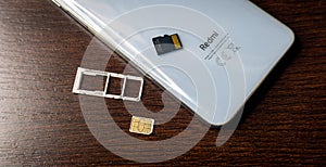 SIM card. SIM card replacement. close-up memory card slot redmi