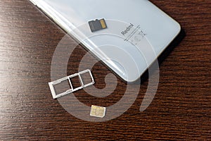 SIM card. SIM card replacement. close-up memory card slot redmi