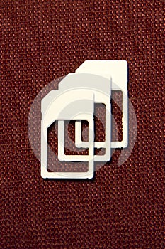 SIM cards micro on brown