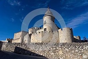 Historical Archive castle of Simancas in Valladolid at sunset with blue sky, Castilla y Leon, photo