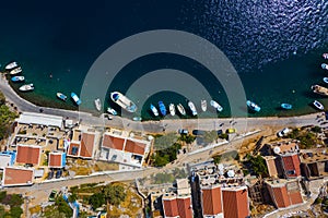 Simi island Greece view from the drone on the colorful houses and Bay of the sea with ships