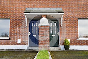 Similar but different entrance door
