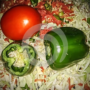 Simla mirch and tomato ready for food photo