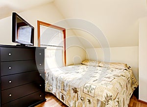 Simple attic bedroom interior. Horse ranch in Washington State