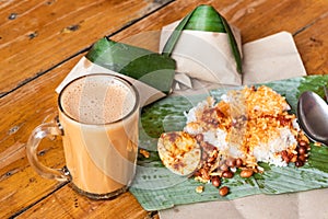 Simple banana leaf nasi lemak and teh tarik breakfast