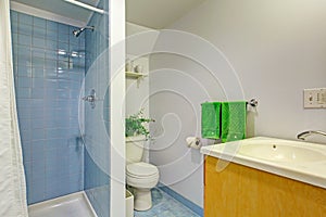 Simple bathroom interior in light blue tones