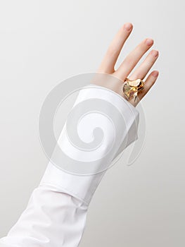 Simple beauty concept - jewelry accessories . Beauty delicate hands with manicure close up . Beautiful female fingers