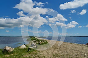 Simple bench and boulders at FilsÃÂ¸ dam Denmark photo