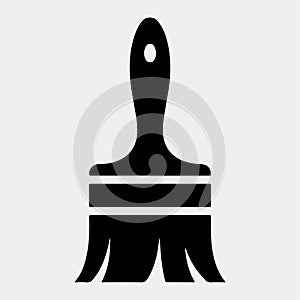 Simple black paintbrush icon for design and art projects