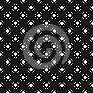 Simple black and white seamless pattern with small perforated circles and dots