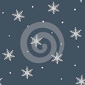 Simple blue festive seamless pattern with hand drawn white snowflakes. Christmas winter design. With falling snowVector