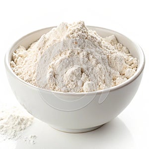 Bowl of flour isolated on white background photo