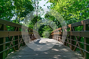 Simple Bridge over the DuPage River along the Naperville Riverwalk in Naperville during Summer