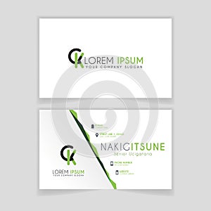 Simple Business Card with initial letter CK rounded edges with green accents as decoration.