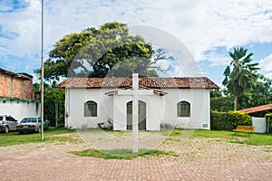 Simple catholic church at the main square in Coqueiros neighborhood photo