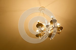 Simple chandelier bottom view with ceiling background