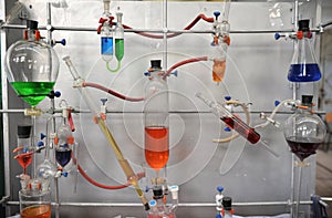 Simple chemical experiments with colored liquid in laboratory.