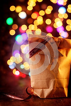 Simple Christmas gift with a colorful party bokeh