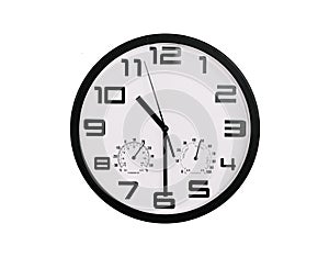 Simple classic black and white round wall clock isolated on white. Clock with arabic numerals on wall shows 10:30 , 22:30