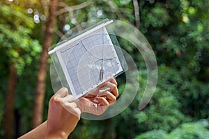 A simple clinometer made from paper is a device for easily measuring the height of objects