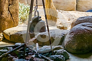 Simple construction with a kettle, outdoor survival equipment