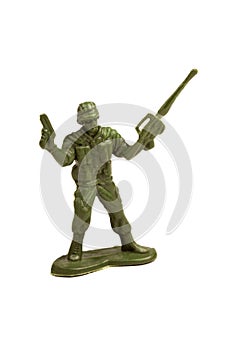 Simple dark green plastic toy soldier holding a pistol and a machine gun in hands, holding them up in a victory gesture, infantry